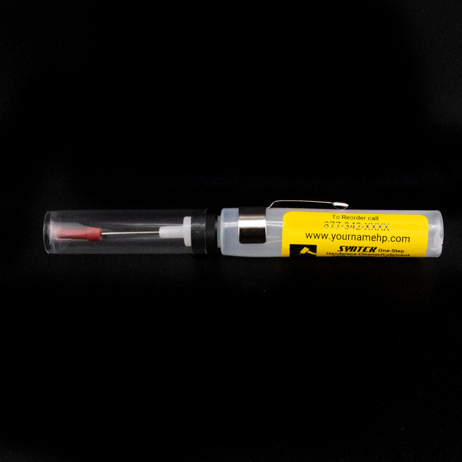 Syringe with a yellow label on a black background